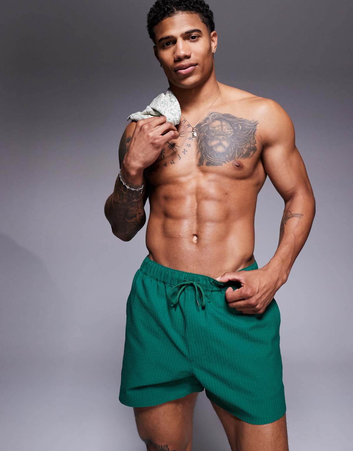 ASOS DESIGN seersucker swim shorts in short length in green