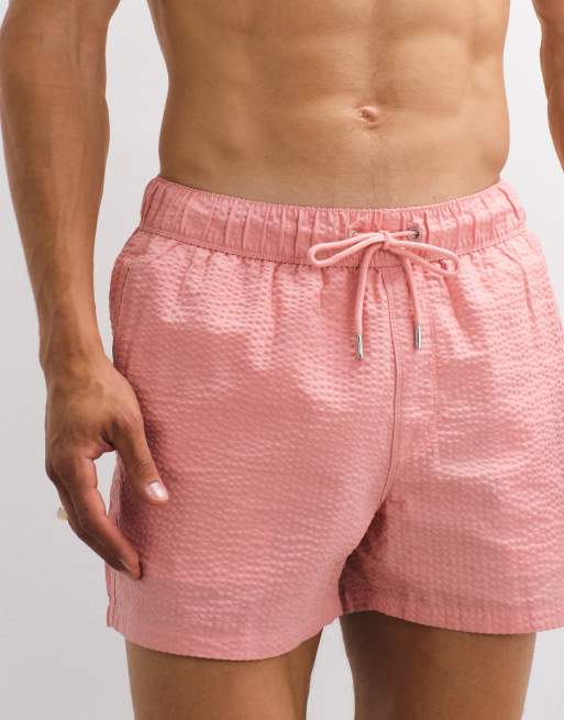 ASOS DESIGN seersucker swim shorts in short length in pink, 3 of 7