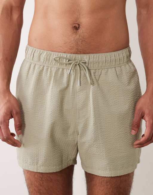 ASOS DESIGN seersucker swim shorts in short length in sage green, 4 of 5