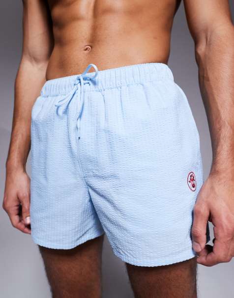 ASOS DESIGN seersucker swim shorts in short length with embroidery - view 1