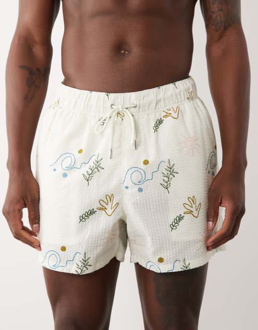 ASOS DESIGN seersucker swim shorts in short length with print in ecru, 4 of 5