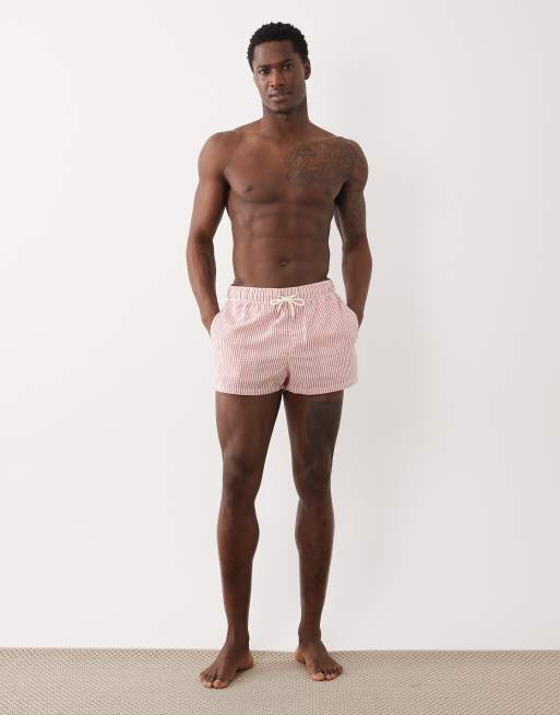 ASOS DESIGN seersucker swim shorts in super short length in red stripe, 2 of 5