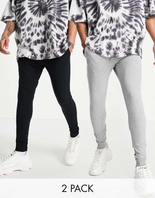 ASOS DESIGN – Sehr enge Jogginghosen in Schwarz/Kalkgrau im 2er-Pack - MULTI