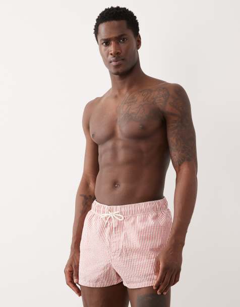 ASOS DESIGN – Sehr kurze Badeshorts aus Seersucker in gestreiftem Rot - view 1