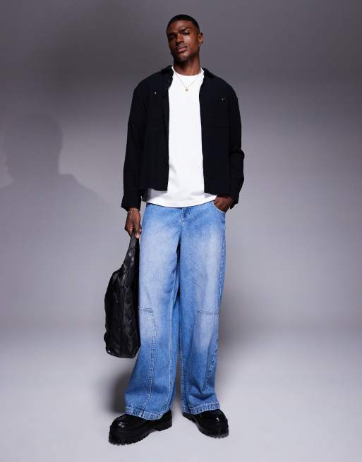 ASOS DESIGN – Sehr weit geschnittene Jeans mit Zimmermann-Details und heller Waschung