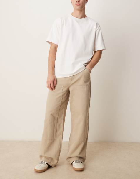 ASOS DESIGN – Sehr weite Carpenter-Jeans mit Stückfärbung in Beige - view 1