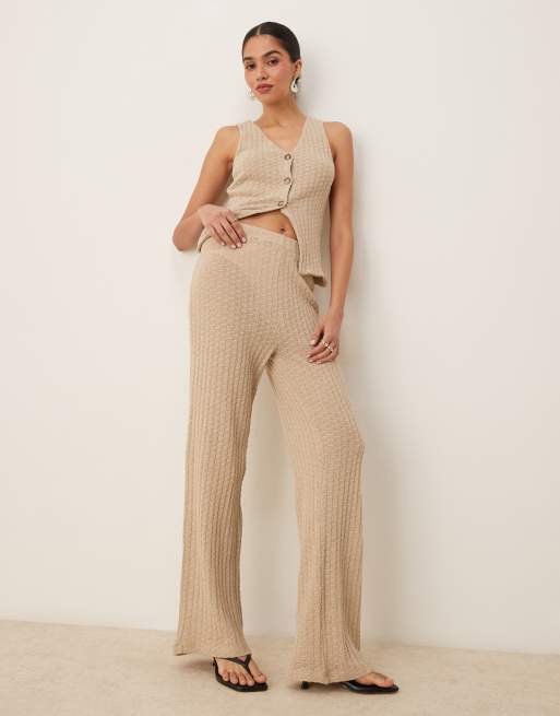 ASOS DESIGN - Semi-doorschijnende gebreide broek met wijde pijpen in stone, deel van co-ord set