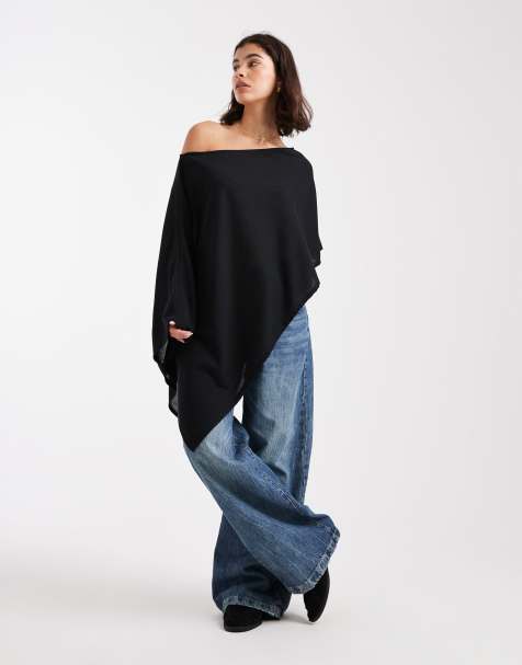 ASOS DESIGN semi sheer knit-look asymmetric one shoulder cape in black - view 1