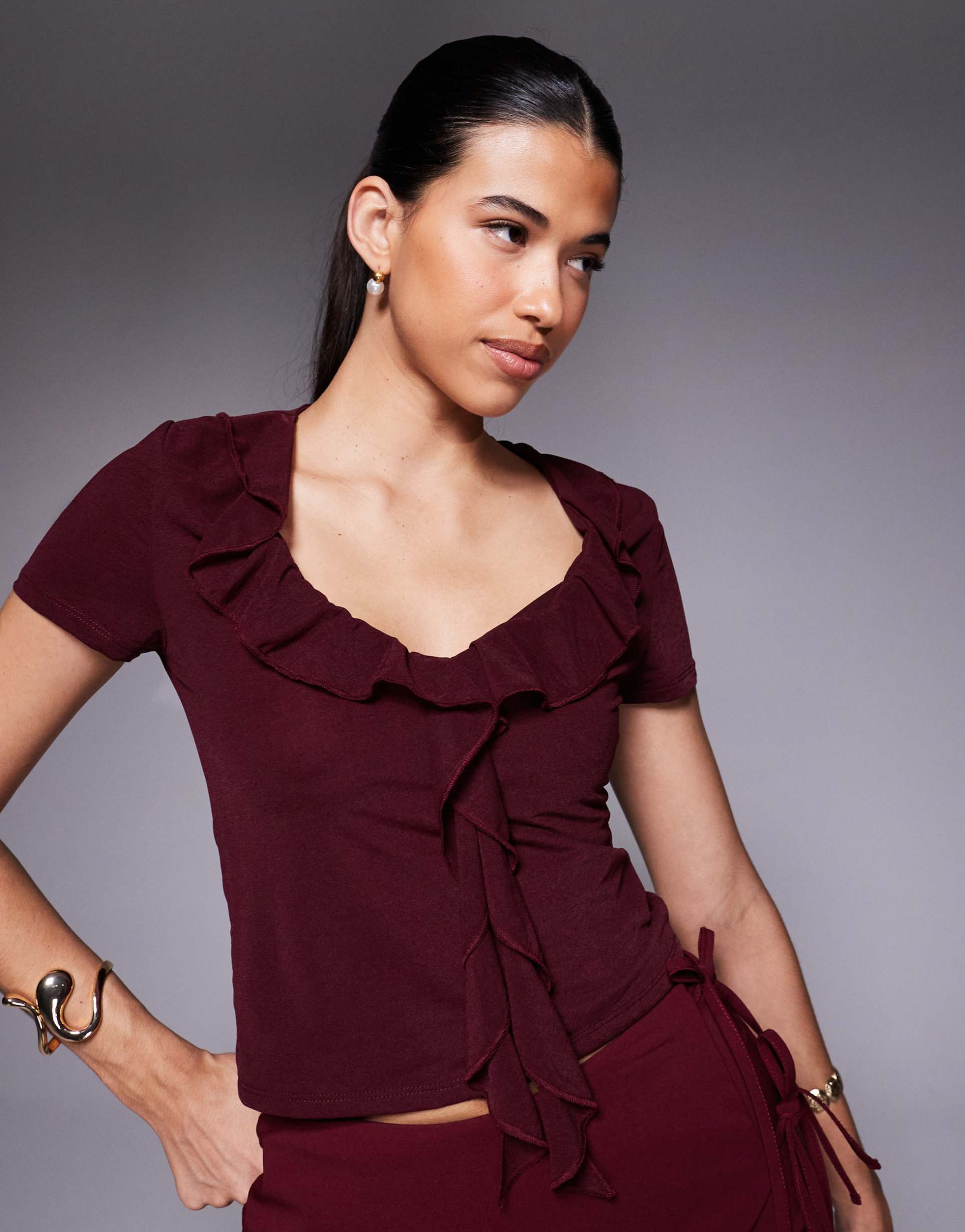 asos design semi sheer short sleeve v-neck ruffle front top in berry