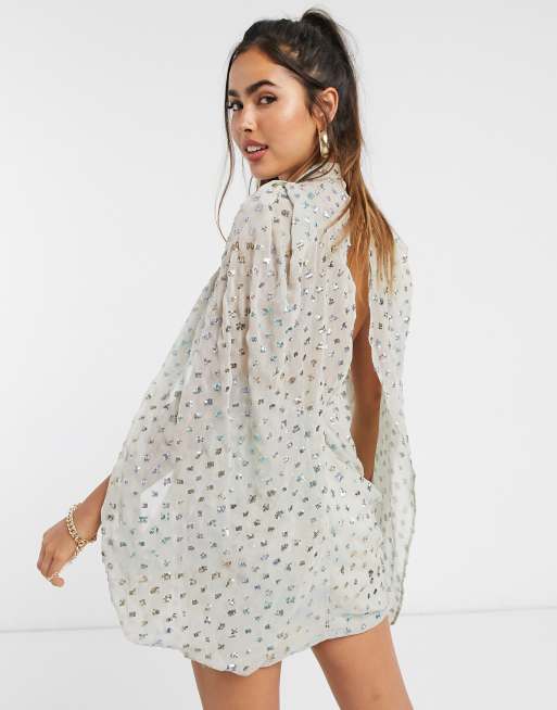 ASOS DESIGN sequin embellished cape sleeve mini dress with wrap skirt