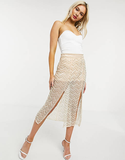 Women sequin midi skirt with chevron detail and double split in pink 