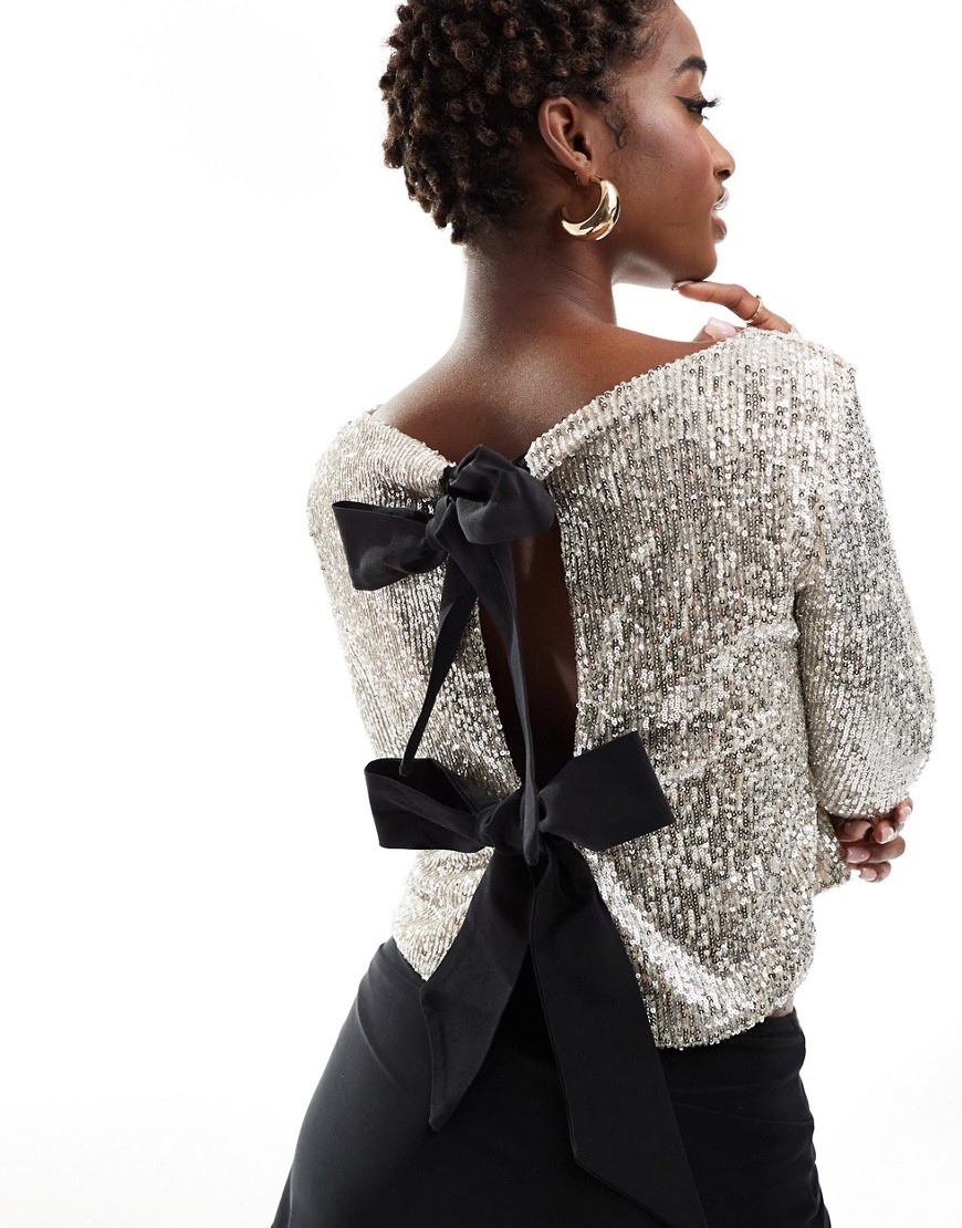 ASOS DESIGN sequin top with satin bow open back detail in silver