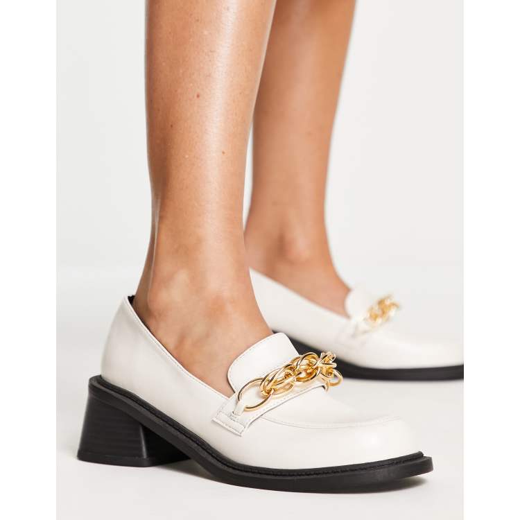 White store heeled loafers