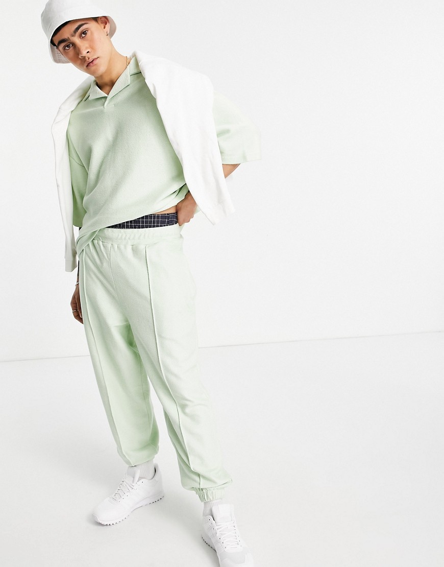 ASOS DESIGN set heavy rib oversized sweatpants with pin tucks in mint green