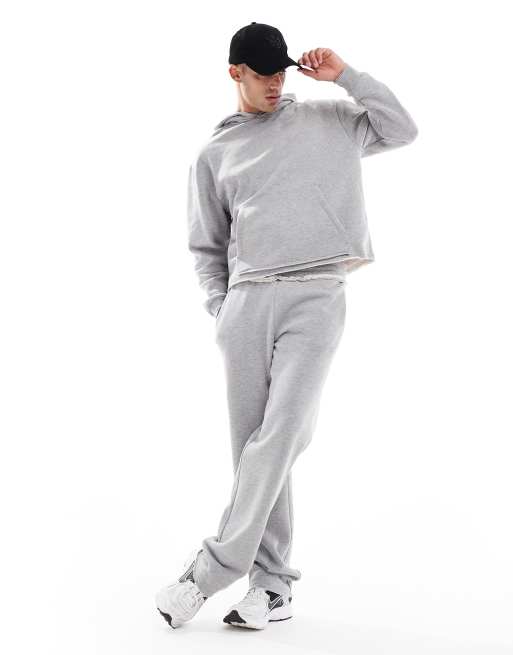 ASOS DESIGN Set in Grau mit unverarbeitetem Saum aus Kapuzenpullover und Jogginghose ASOS