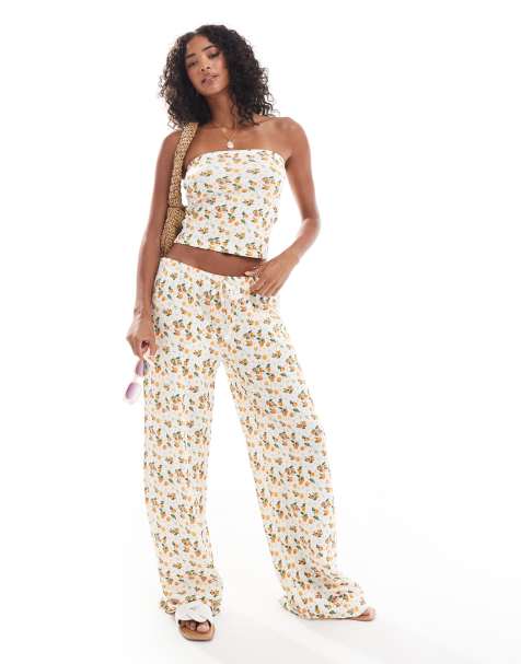 ASOS DESIGN – Set in Orange aus Hose mit weitem Bein und trägerlosem Oberteil mit Waffelstruktur und Obst-Print - view 1