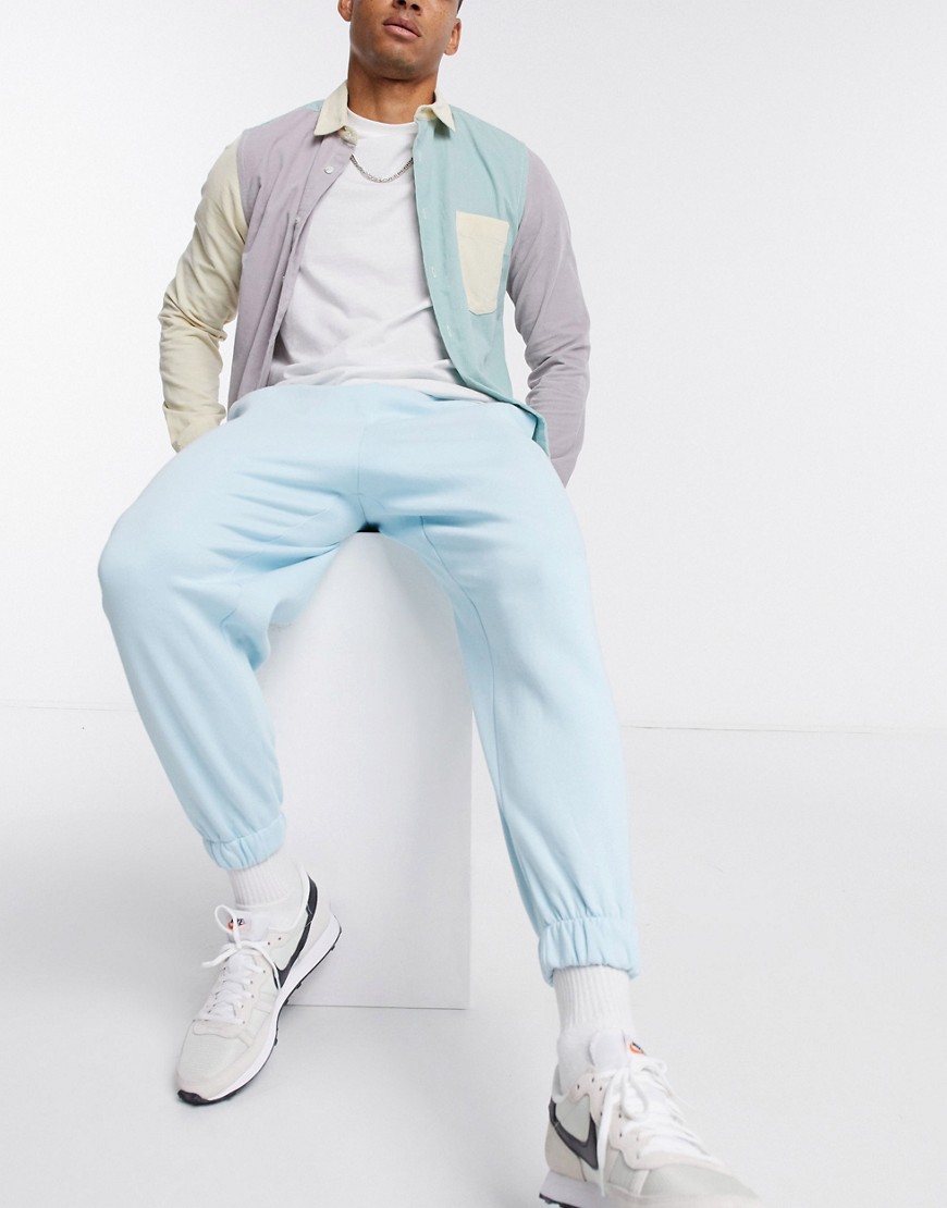 ASOS DESIGN set oversized cropped sweatpants in pastel blue with contrast stitch