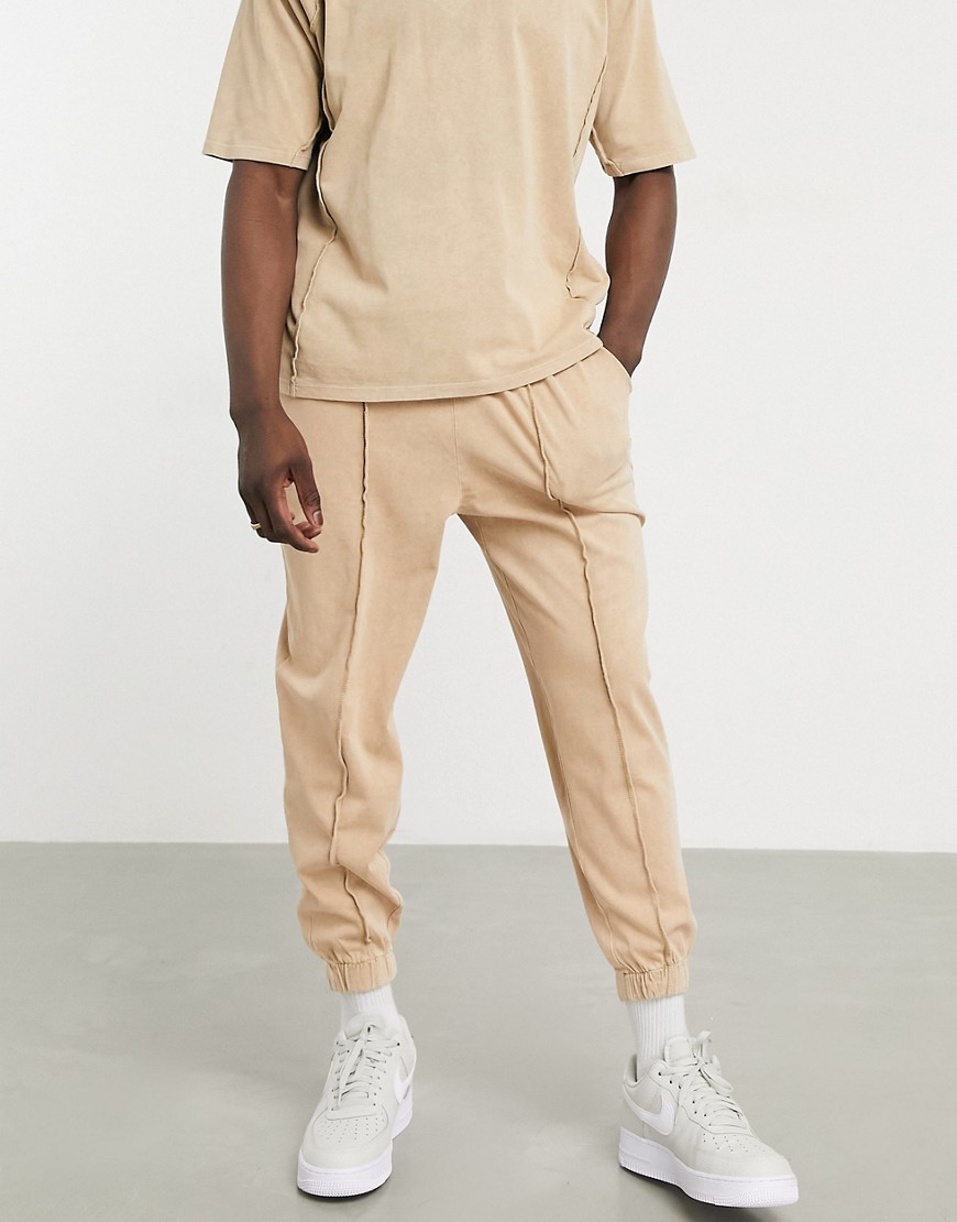 ASOS DESIGN set oversized sweatpants in acid wash with seam detail-Neutral