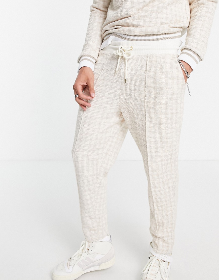 ASOS DESIGN set tapered sweatpants in smart textured check with fixed hem & pin tucks-Neutral