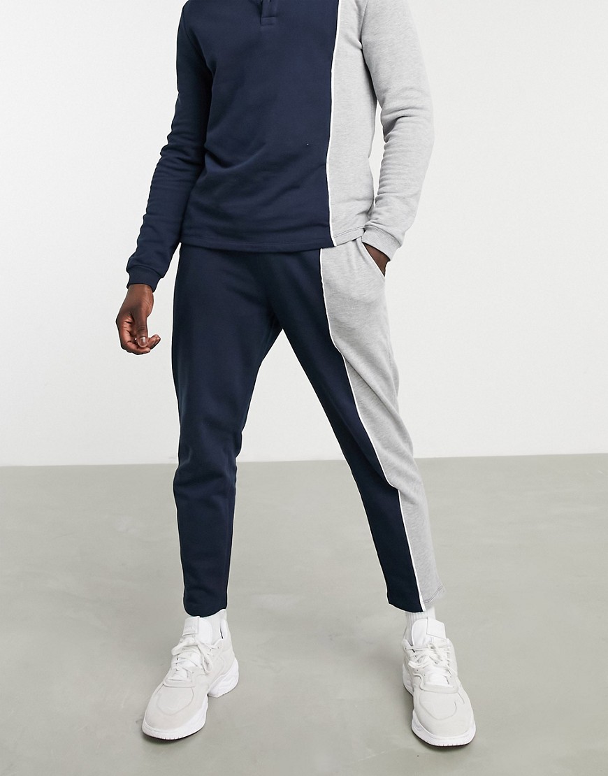 ASOS DESIGN set tapered sweatpants with fixed hem with vertical color block panels & piping-Navy