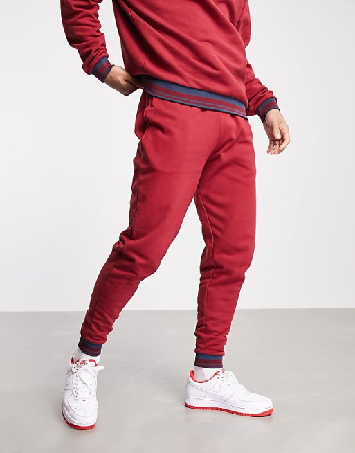ASOS DESIGN set tapered sweatpants with tipping in red | ASOS