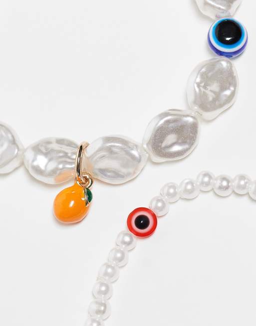 ASOS DESIGN - Set van 2 armbanden met oogkralen in imitatie parel, 2 van 3