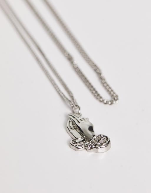 ASOS DESIGN - Set van 2 ketting met hangertje in vorm van in gebed gevouwen handen in zilverkleur