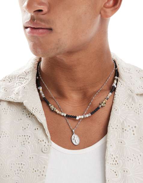 ASOS DESIGN - Set van 2 kettingen met kralen en roestvrijstalen kruishanger in zilver en zwart - view 1