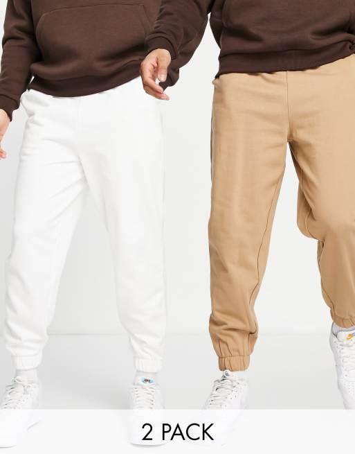 ASOS DESIGN - Set van 2 oversized joggingbroeken in zachtwit en beige