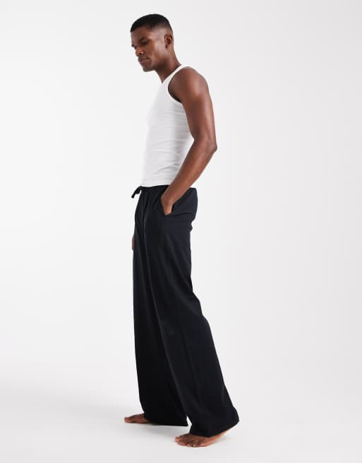 ASOS DESIGN - Set van 2 paar loungebroeken in zwart en gemêleerd grijs, 2 van 4