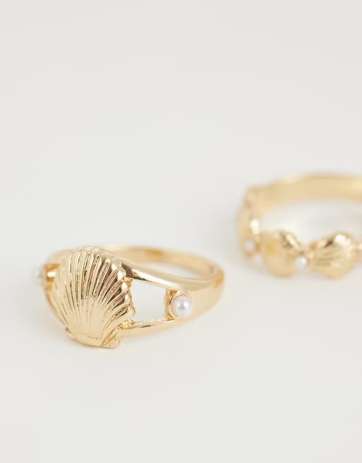 ASOS DESIGN - Set van 2 ringen met mini schelpen in goudkleur, 2 van 3