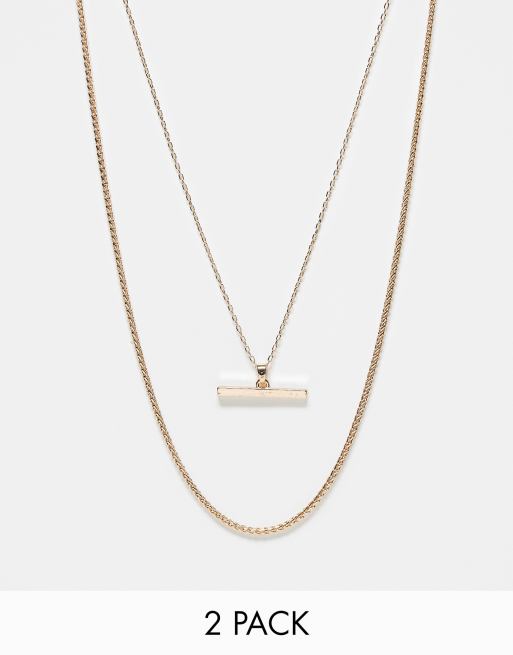 ASOS DESIGN - Set van 2 schakelkettingen met T-staafje in goudkleur 
