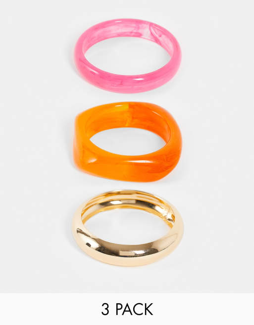 ASOS DESIGN - Set van 3 armbanden van gemengd plastic en metaal in goudkleur