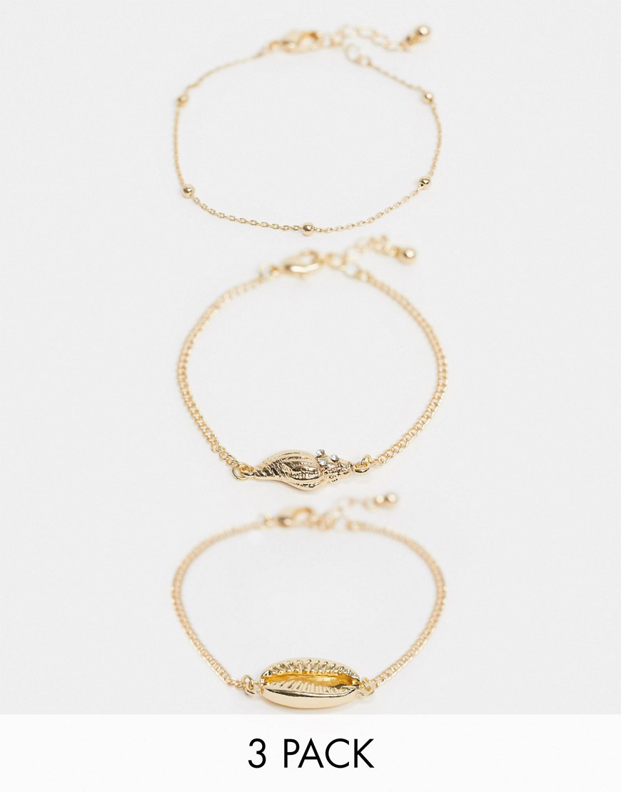 ASOS DESIGN - Set van 3 kettingarmbanden met schelpbedeltjes in goudkleur