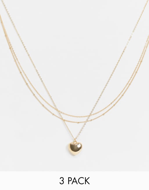 ASOS DESIGN - Set van 3 kettingen met hartvormig hangertje en met bolletjes en staafjes in goudkleur