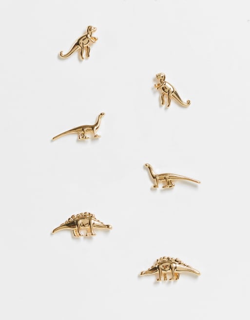 ASOS DESIGN - Set van 3 paar oorbellen met dinosaurussen in goudkleur