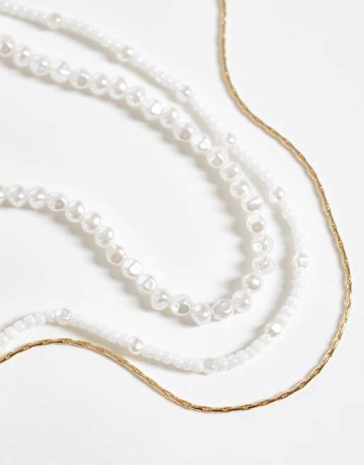 ASOS DESIGN set van 3 parel- en kettingkettingen in goud, 3 van 4