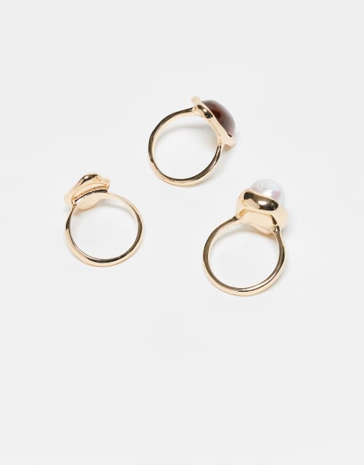 ASOS DESIGN - Set van 3 ringen met imitatieparel en gesmolten ontwerp in goudkleur, 3 van 3