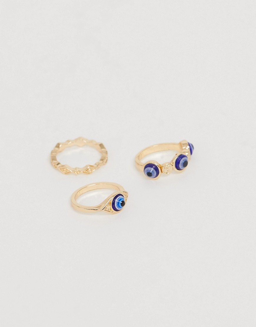 ASOS DESIGN - Set van 3 ringen met oog-detail in goudkleur