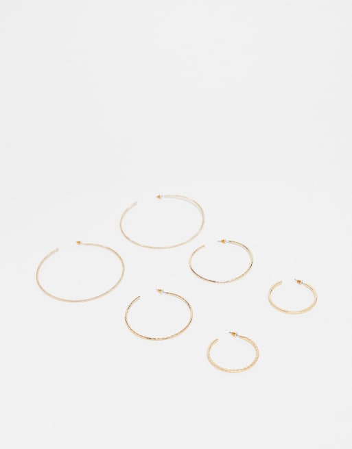 ASOS DESIGN - Set van 3 skinny oorbellen met gegraveerd ontwerp in goudkleur