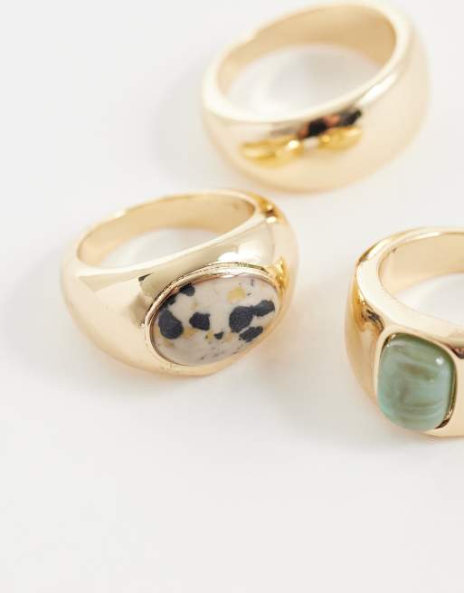 ASOS DESIGN - Set van 3 stapelringen met groene en dalmatiërsteen in goudkleur, 2 van 3