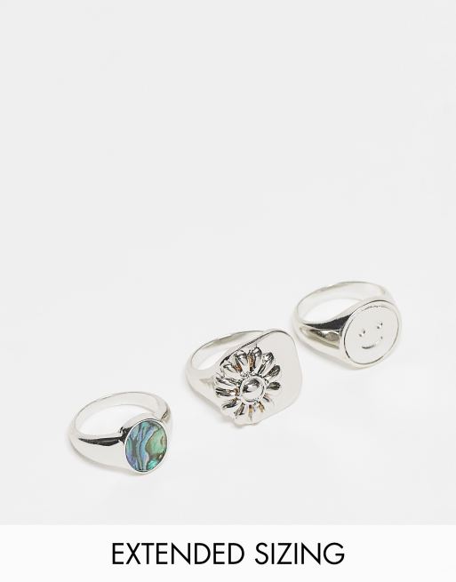 ASOS DESIGN - Set van 3 zegelringen met glimlachend gezichtje en bloem in zilverkleur
