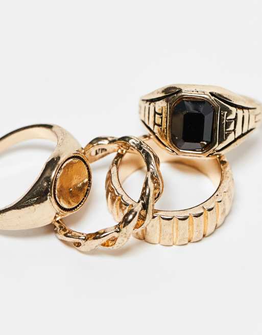 ASOS DESIGN - Set van 4 brede- en zegelringen in goud  , 2 van 4