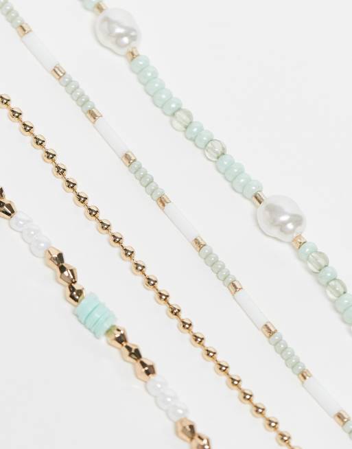 ASOS DESIGN - Set van 4 enkelbandjes met groen en goud kralenontwerp, 4 van 4