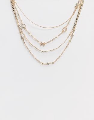 ASOS DESIGN  Halsketten mit XO- und Blitz-Anhänger in Gold, 4er-Pack Gold
