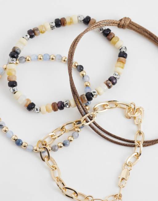 ASOS DESIGN - Set van 4 kralen- en schakelarmbanden in neutraal, 2 van 3