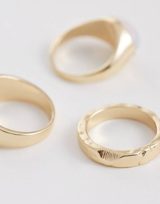 ASOS DESIGN - Set van 4 ringen met ovale steen en zeshoekig design in goud, 2 van 3