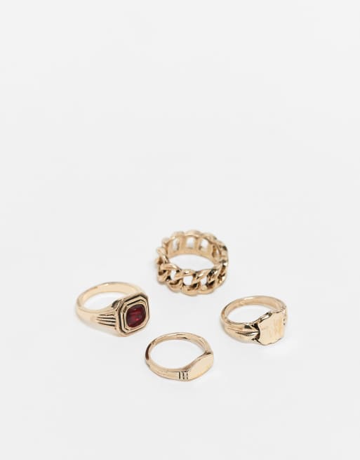 ASOS DESIGN - Set van 4 zegelringen in antieke goudkleur