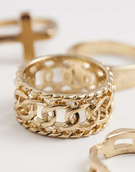 ASOS DESIGN - Set van 4 zegelringen met kruis en ketting in goud, 2 van 3