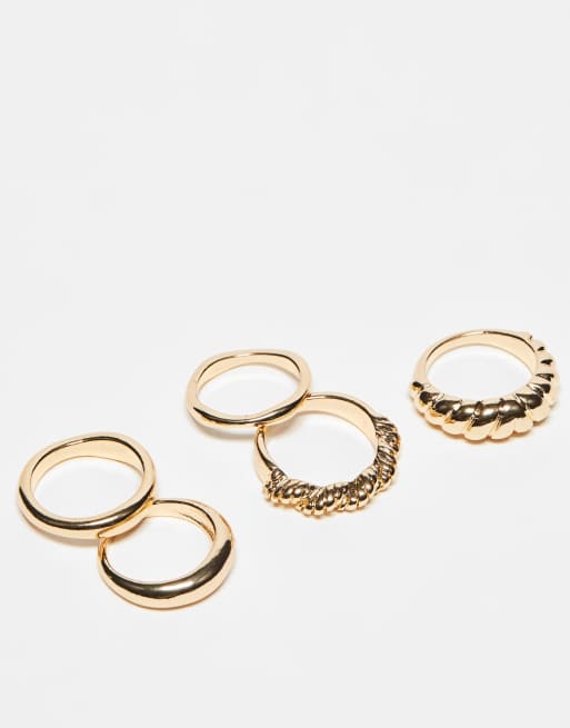 ASOS DESIGN - Set van 5 ringen met gedraaid ontwerp in goudkleur